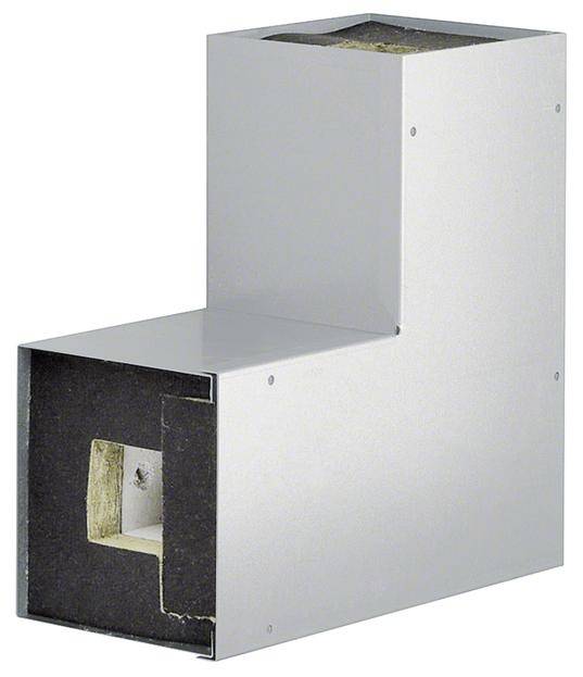 Componente argentato a forma di L con interno aperto e isolamento visibile. Utilizzato nel settore edile per scopi di ventilazione o riscaldamento.