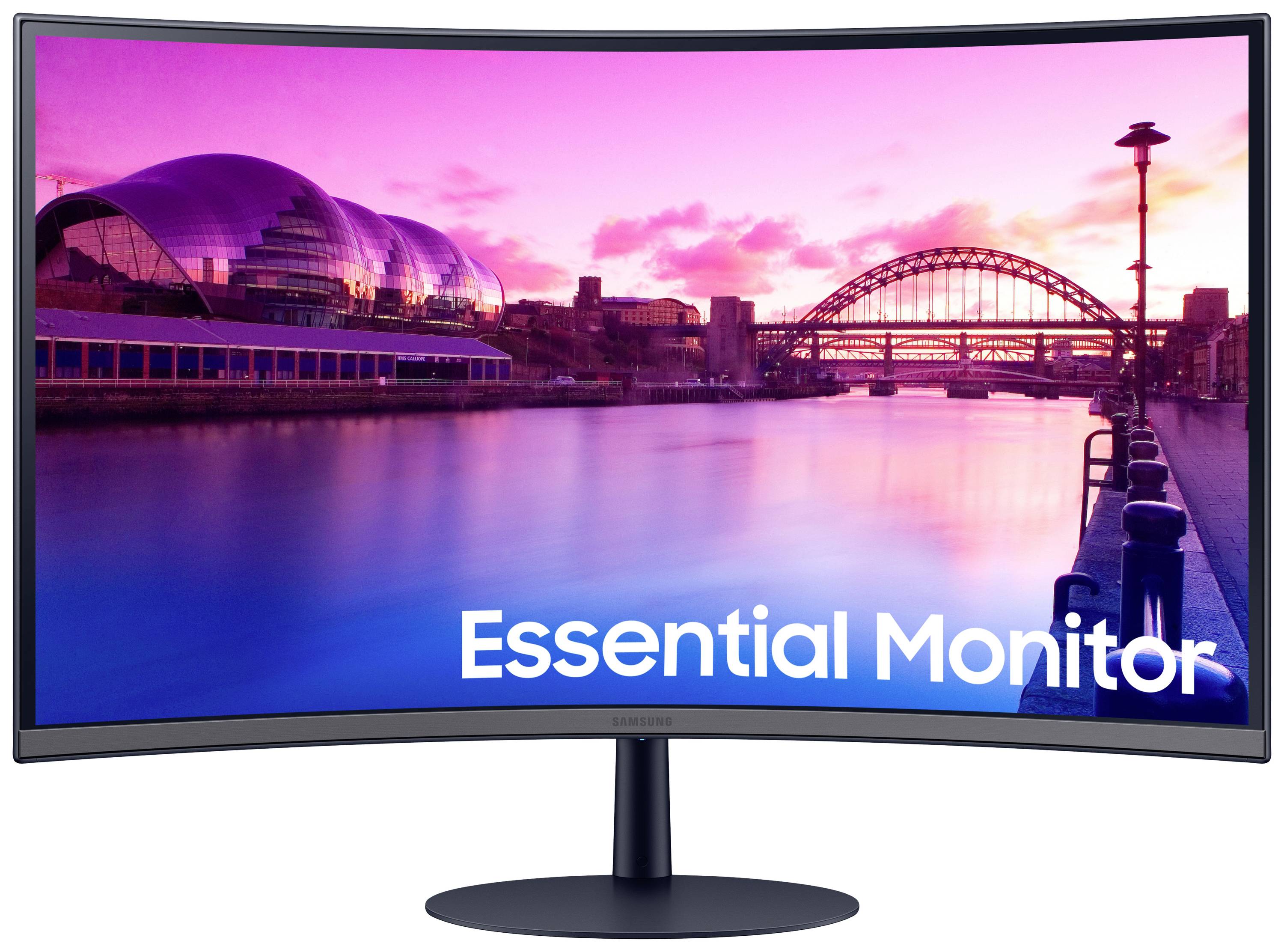 Un monitor curvo mostra un paesaggio urbano serale con un fiume, un ponte e edifici moderni. In basso c'è scritto 'Essential Monitor'.