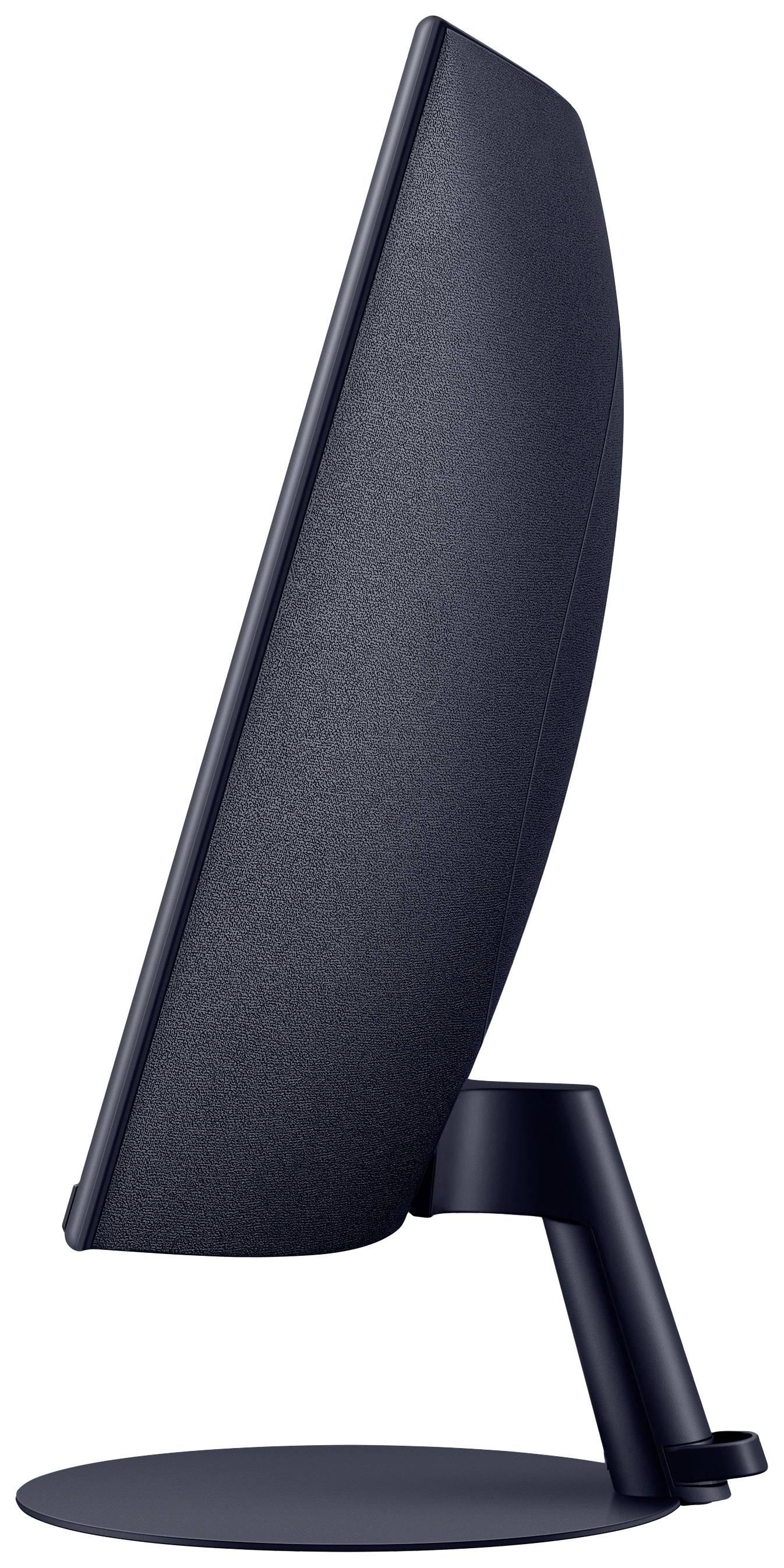 Un monitor nero fotografato di lato, con un design sottile e moderno, poggiato su un piedistallo rotondo.