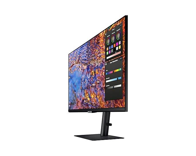 Un monitor del computer con uno sfondo astratto e colorato mostra un profilo laterale.