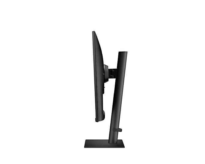 Un monitor nero per computer visto di lato, che mostra un design sottile e moderno con una base stabile.