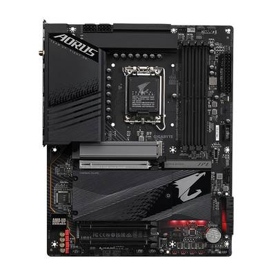 Una scheda madre nera con il logo 'AORUS', dotata di diversi slot e connettori. Adatta per PC ad alte prestazioni.
