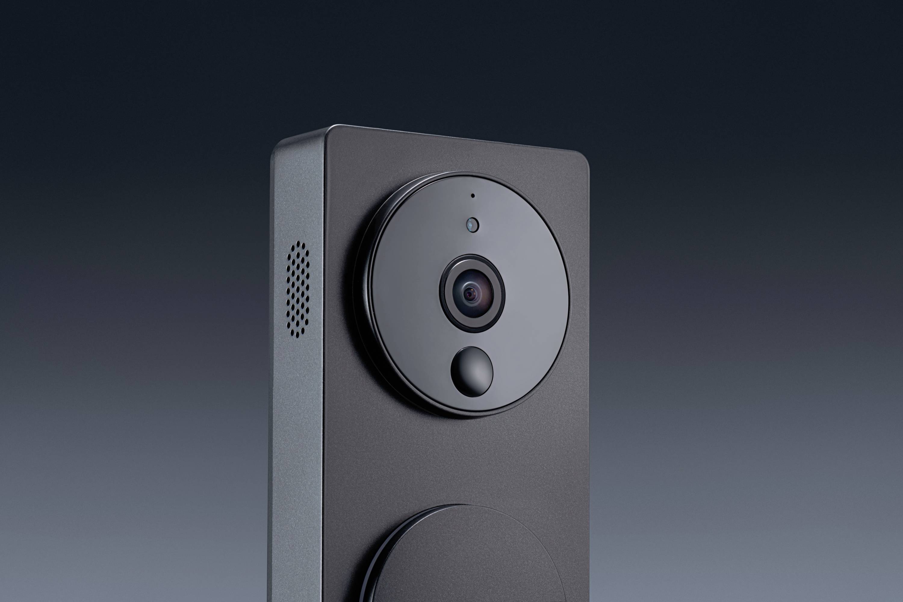 Telecamera di sorveglianza nera con obiettivo circolare e microfono, su sfondo grigio scuro.