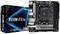 Una scheda madre ASRock B550M-ITX/ac accanto alla sua confezione. La scheda madre mostra connettori e componenti per hardware da computer.