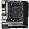 L'immagine mostra una scheda madre ASRock B550M-ITX/ac con slot PCIe e slot RAM, adatta per case di computer compatti.