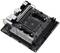 Scheda madre nera per computer con diversi slot e connessioni, contrassegnata con 'ASRock B550M-ITX/ac', per componenti PC.