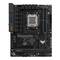 L'immagine mostra una superficie della scheda madre ASUS TUF Gaming con socket della CPU, slot RAM e slot di espansione.