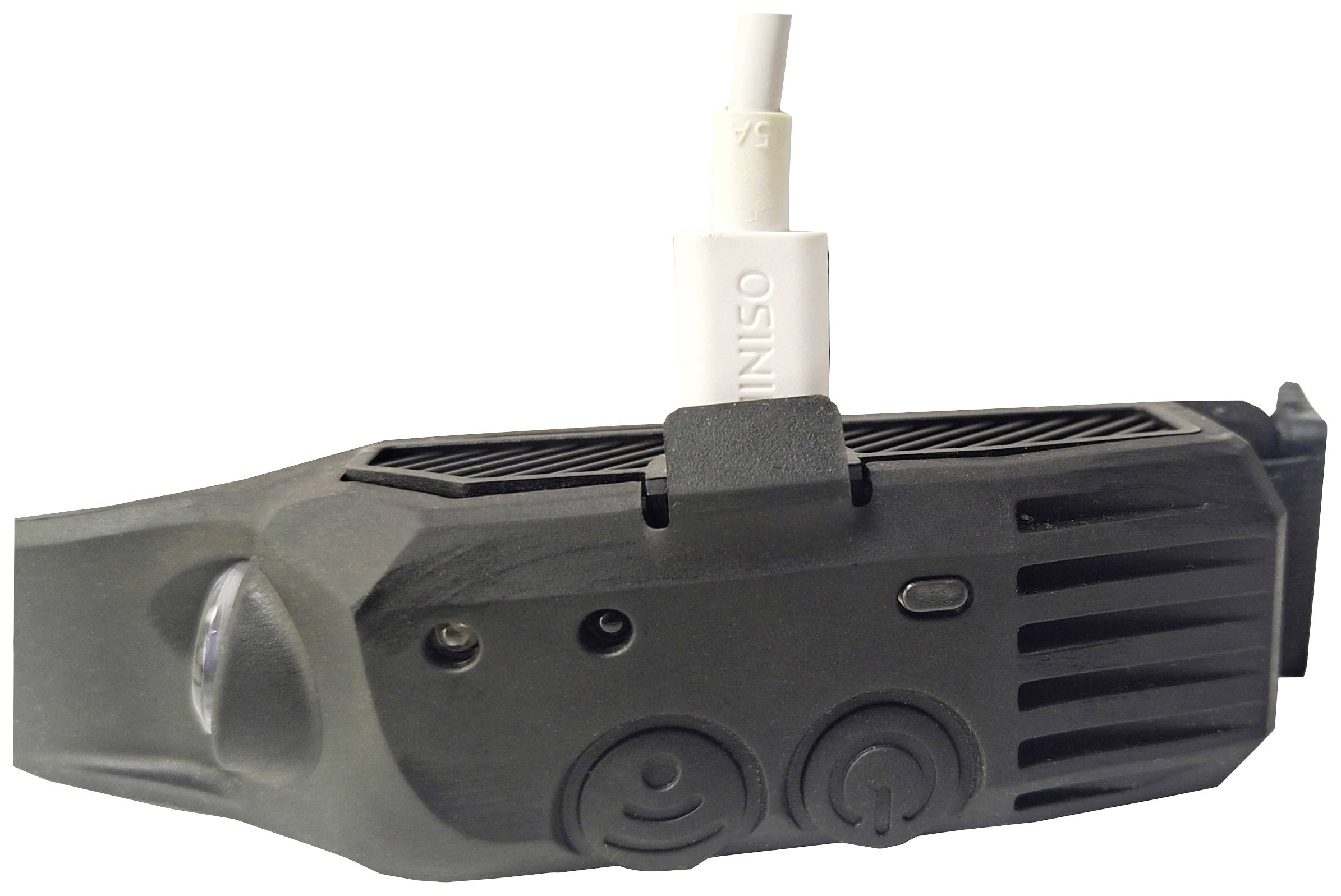 Un dispositivo nero con due pulsanti, un obiettivo e un cavo bianco collegato. Probabilmente una fotocamera o un dispositivo tecnico.