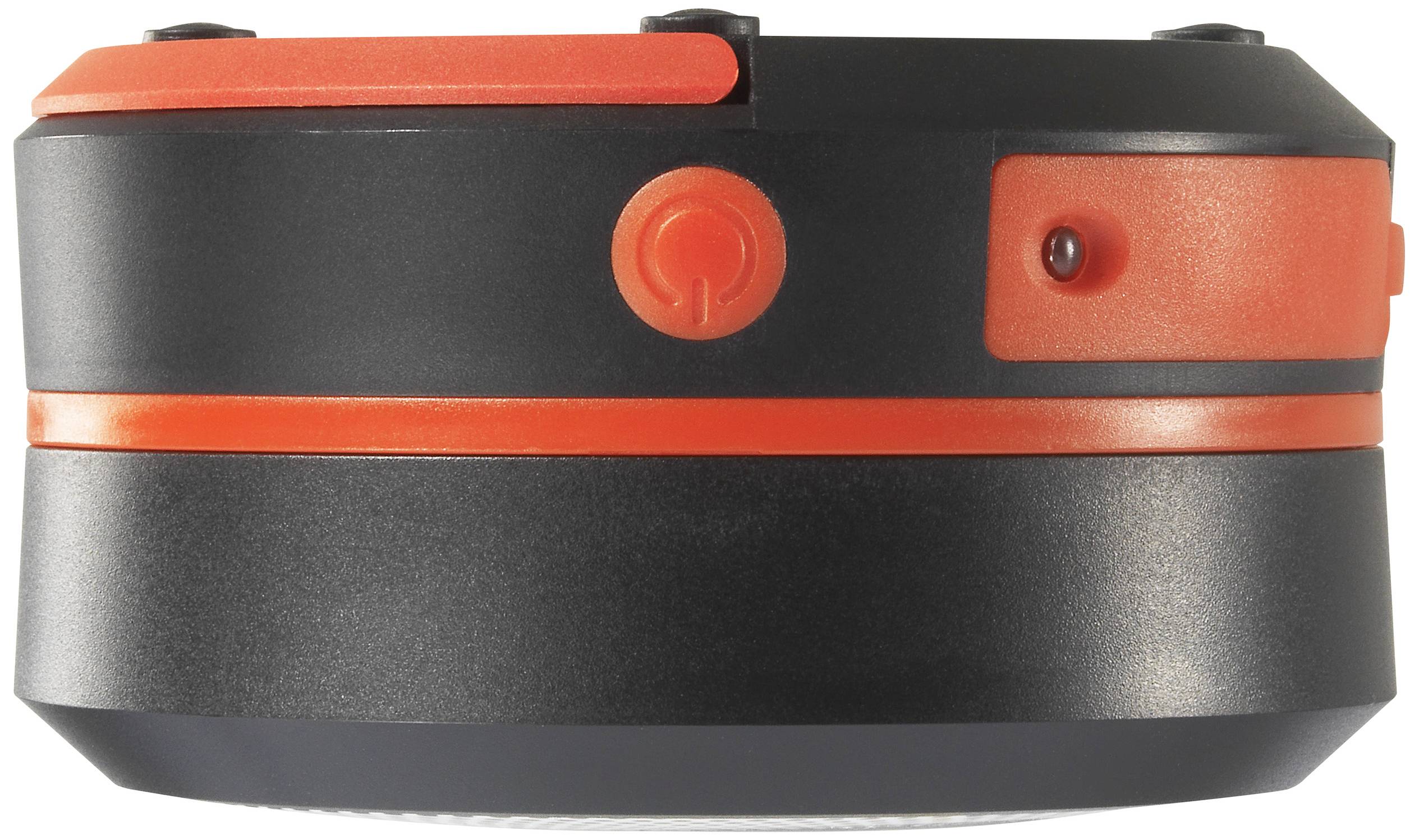 Un pulsante nero e rosso su un dispositivo, probabilmente per il controllo o l'attivazione. Design elegante e compatto.