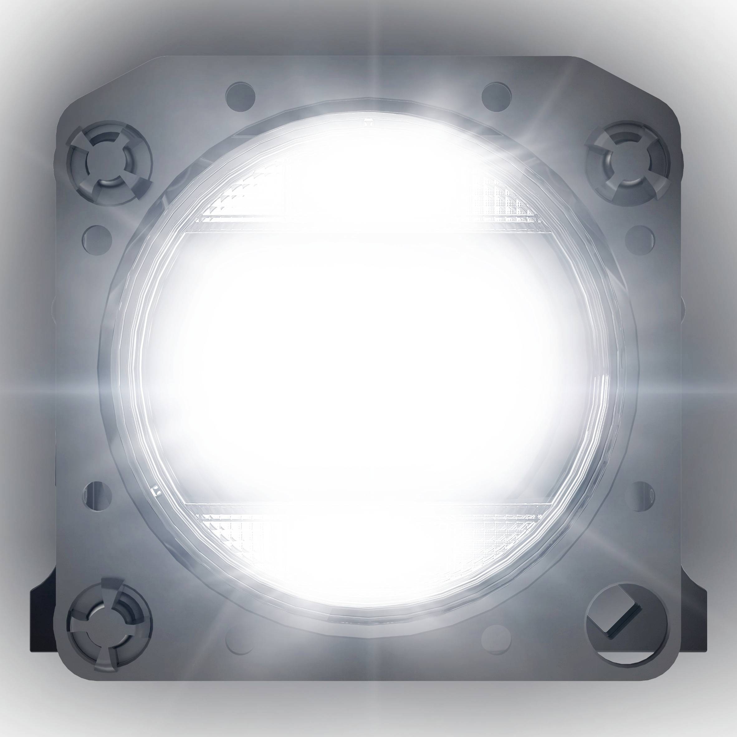 Una luce intensa e rotonda risplende da un dispositivo quadrato con bordi scuri. Funzione e contesto della luce sono sconosciuti.