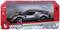 Modellino auto in scala 1:18, modello '296 GTB Assetto Fiorano' di Bburago, in colore grigio con strisce gialle, in confezione rossa.