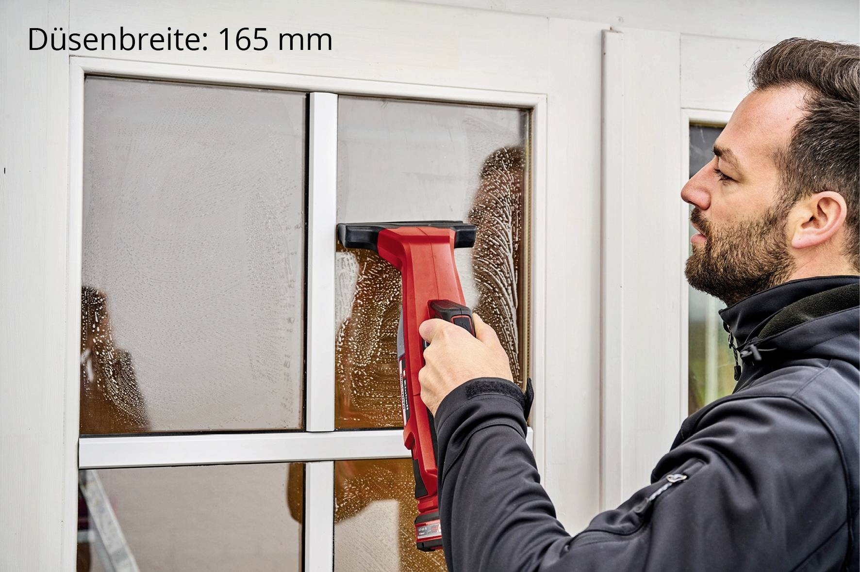 Un uomo sta pulendo una finestra con un pulisci vetri. In alto a sinistra è riportato 'Larghezza ugello: 165 mm'.