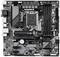 Scheda madre del computer vista dall'alto con diversi slot PCIe, slot RAM e un socket per CPU. Numerose porte e componenti elettronici sono visibili.