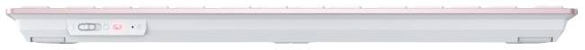 Una tastiera wireless in vista laterale con accenti rosa e un interruttore sul lato sinistro.