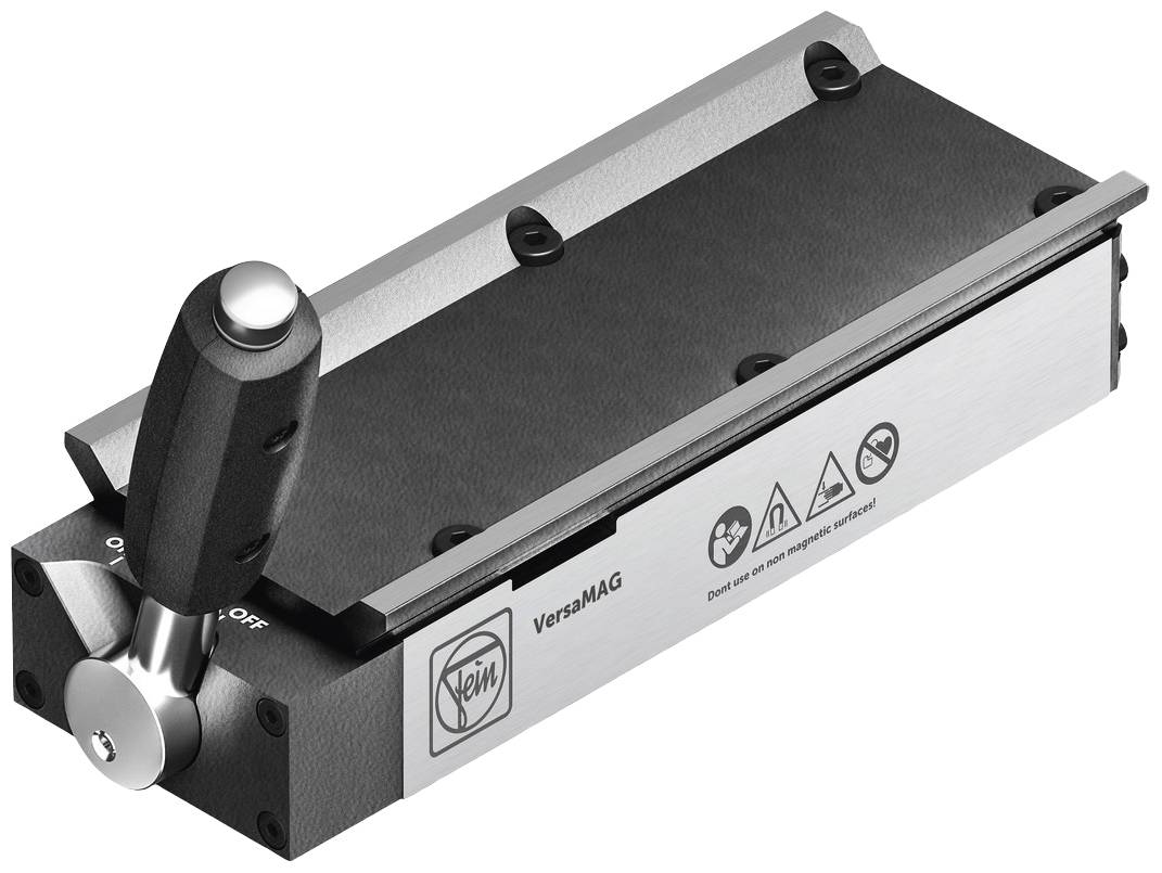 Piastra magnetica con impugnatura a leva, logo triangolare e vari simboli di avvertenza sul lato. Progettata per soluzioni di fissaggio versatili.