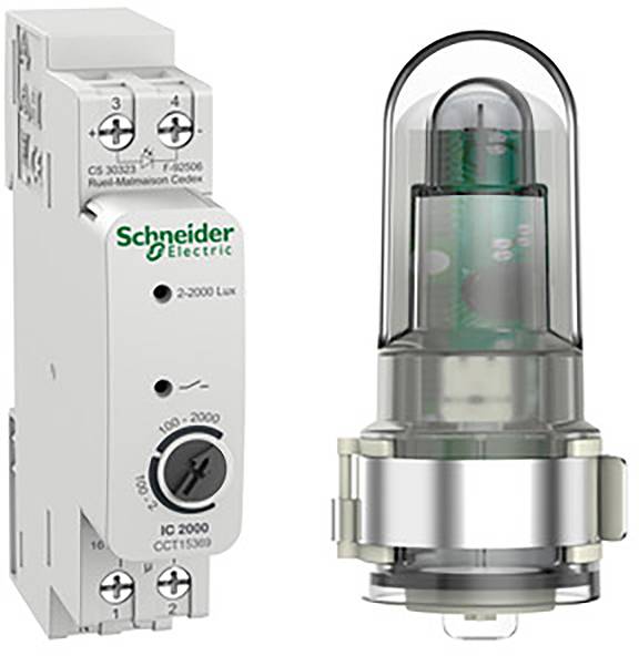 Dispositivo industriale: A sinistra un relè temporizzatore di Schneider Electric, a destra un componente sensore trasparente, entrambi per l'automazione industriale.