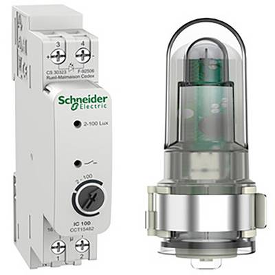 L'immagine mostra un relè fotosensibile di Schneider Electric, numero di modello CS 3023 Z4. Accanto ad esso un sensore corrispondente con cupola in vetro.