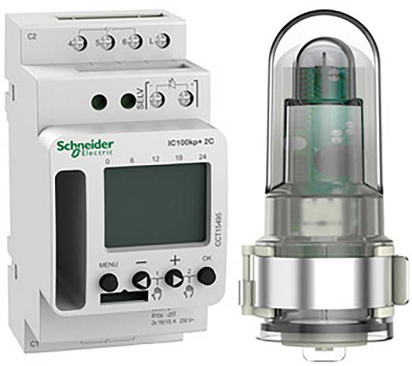 Dispositivo elettronico di temporizzazione accanto a un tubo di protezione trasparente con componenti elettroniche, adatto per applicazioni industriali.