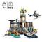 Kit LEGO per bambini dai 7 anni con 980 pezzi; include un elicottero, una barca, un kayak e un edificio costiero con torre.