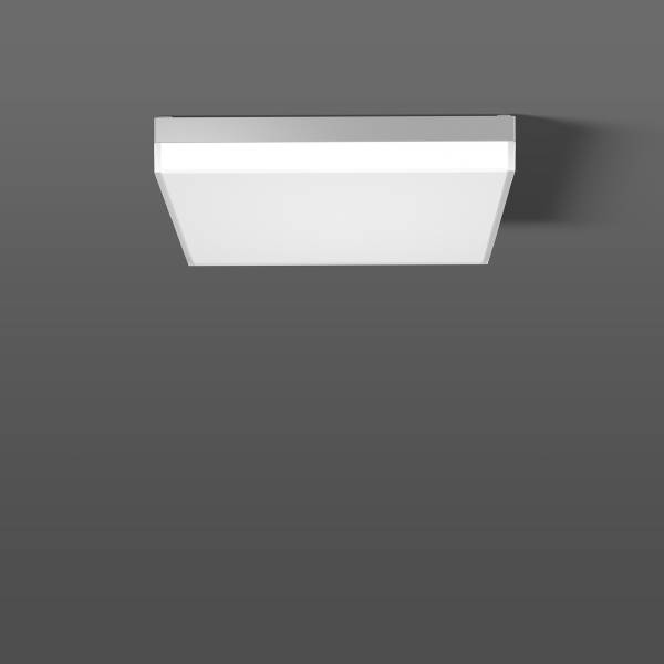 Una lampada da soffitto bianca, rettangolare, montata su una parete grigia, che emana una luce uniforme.