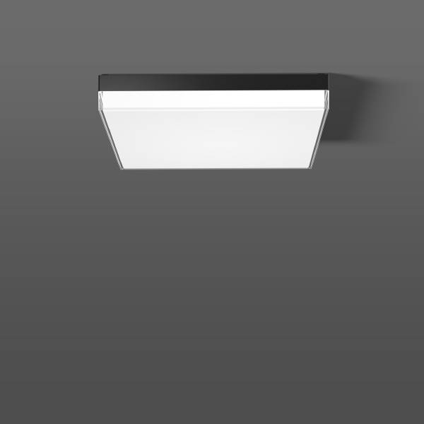 Un pannello LED quadrato con cornice nera e diffusore bianco, montato su un soffitto grigio.