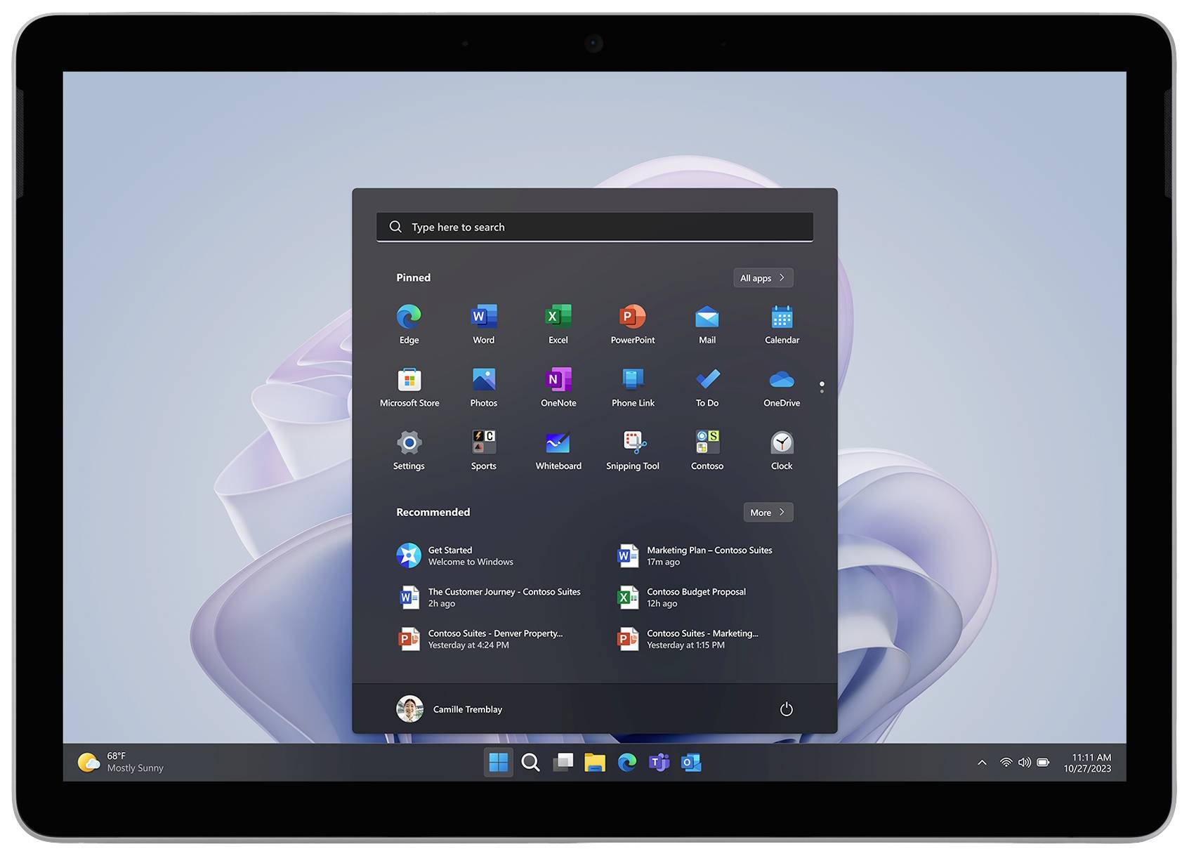 Tablet con menu di avvio aperto che mostra applicazioni comuni come Edge, Word ed Excel. Sullo sfondo un'immagine grafica astratta. Ora 10:41.