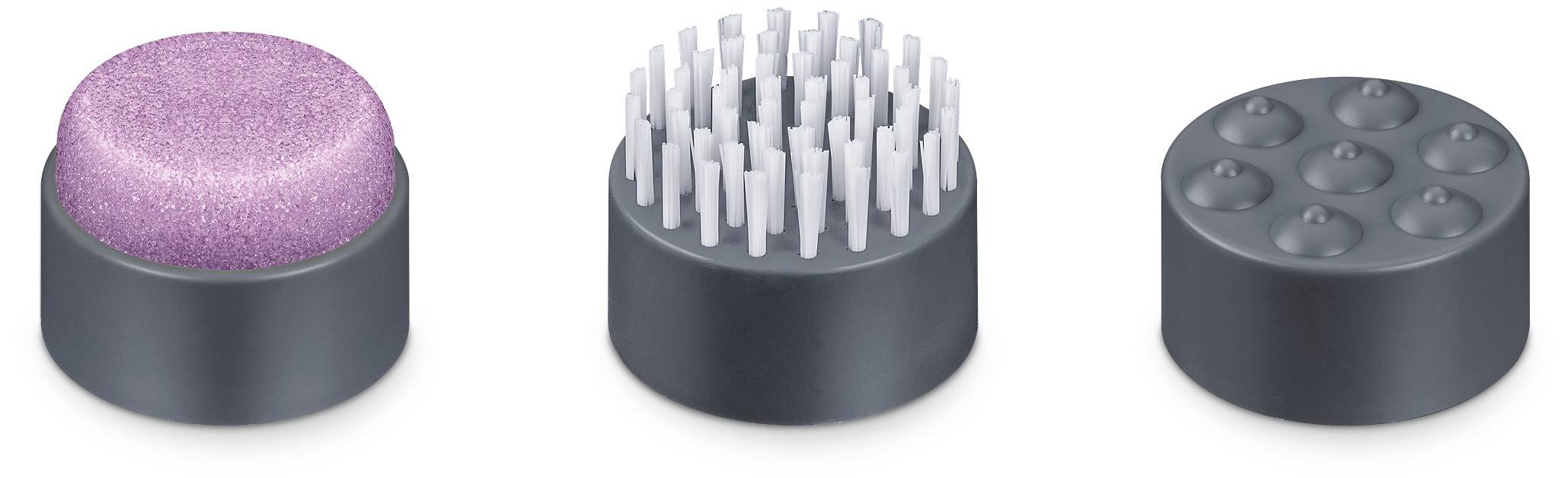 Tre teste di spazzola diverse: spugna rosa, punte in plastica e superficie con rilievi. Accessori per un dispositivo di cura o un utensile di bellezza.