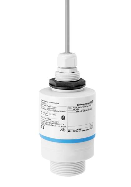 Un sensore cilindrico bianco con marcatura blu e connessione elettrica in alto. Etichetta con dettagli tecnici e logo visibile.
