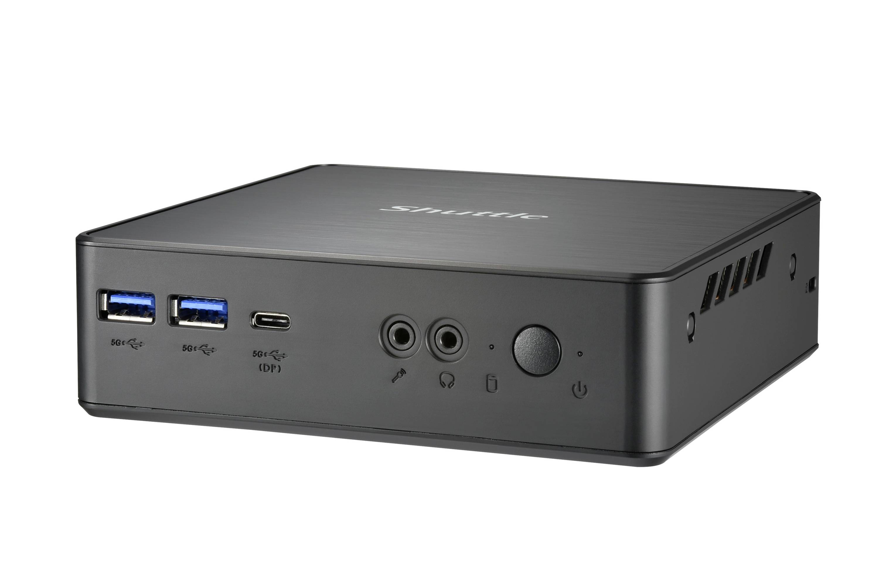 Un mini PC compatto nero con più porte USB e jack audio sul lato frontale.