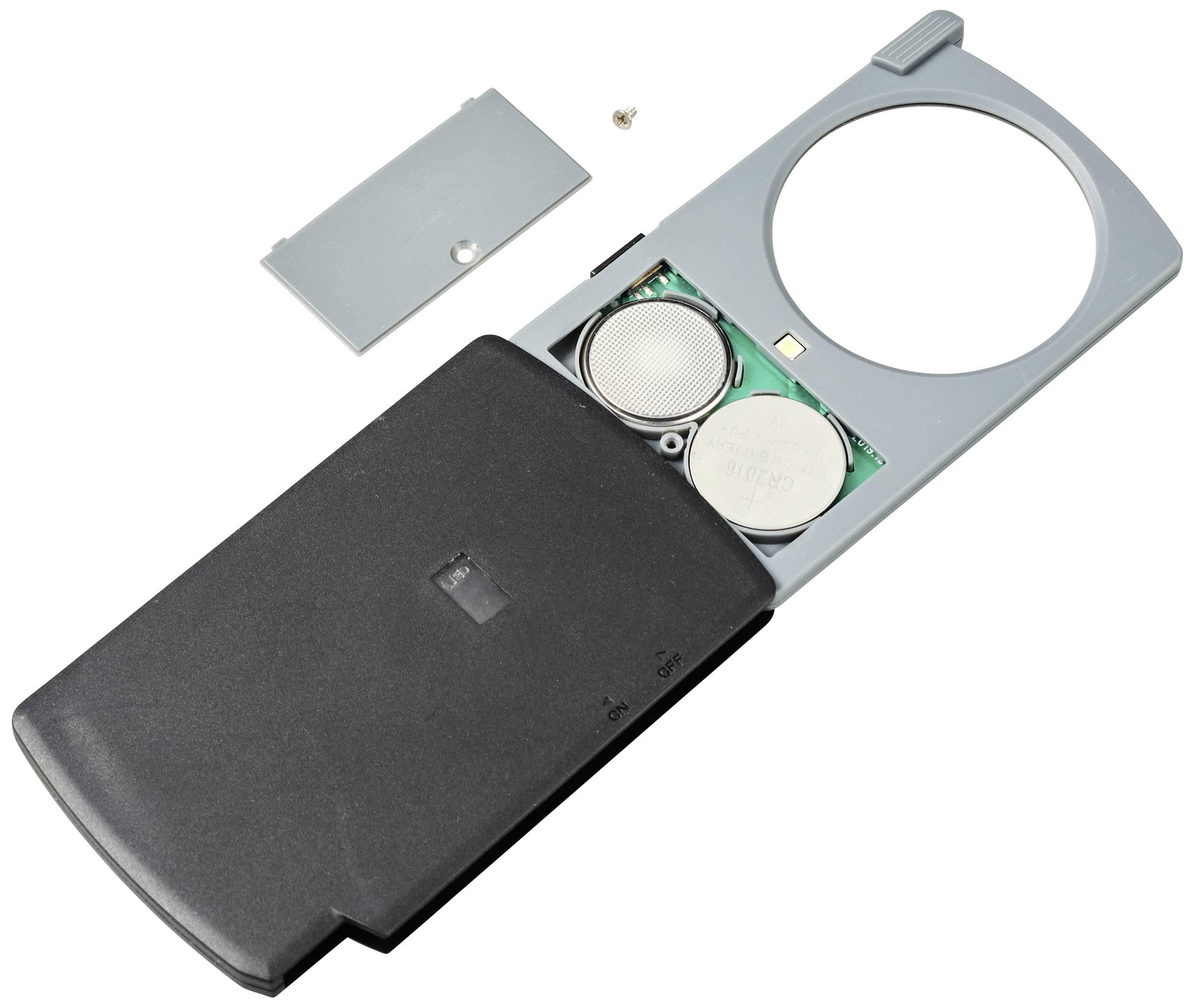 Un telecomando con il coperchio del vano batterie rimosso mostra due batterie a bottone e un piccolo cacciavite.