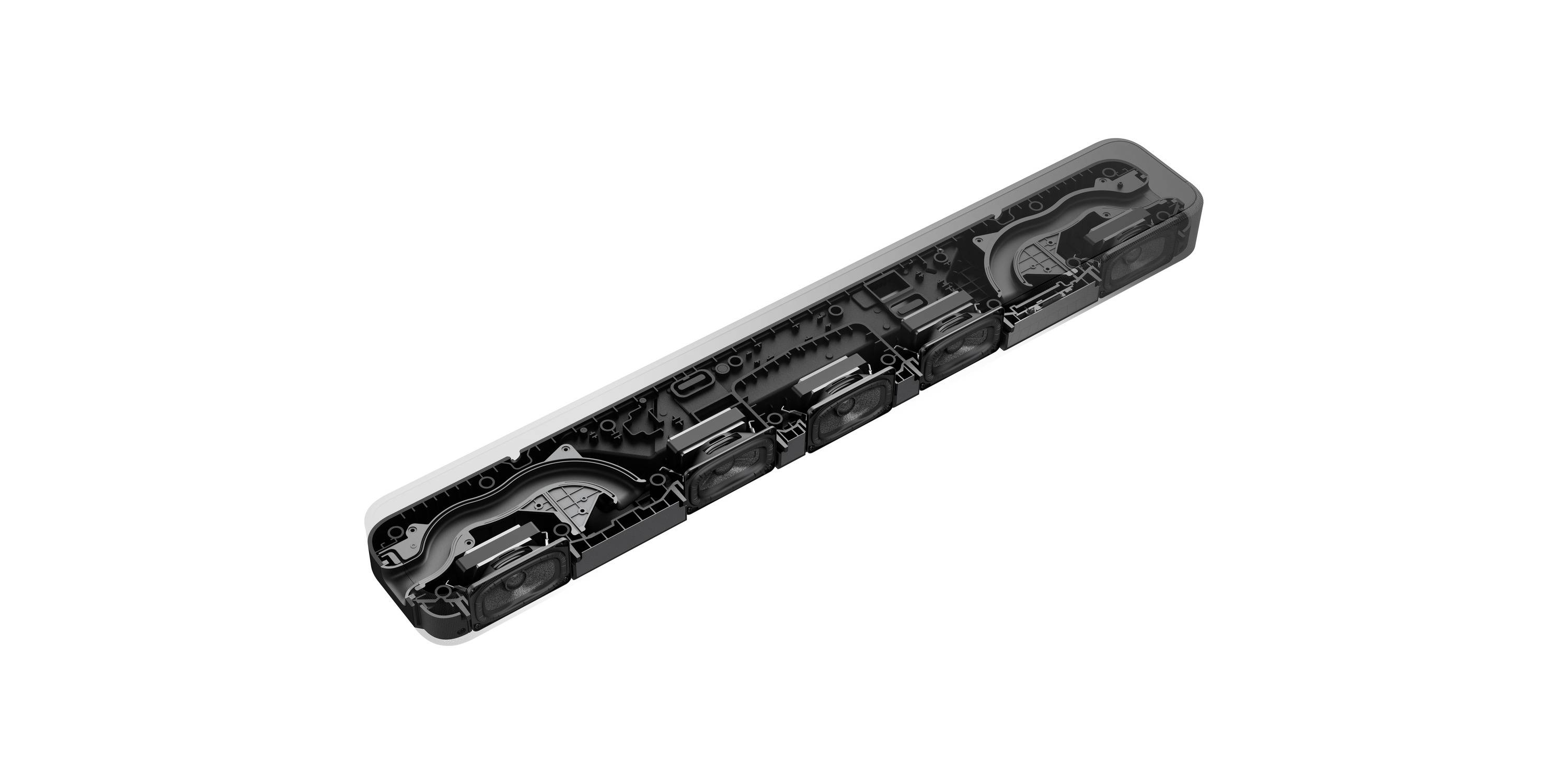 Parte lunga e sottile in plastica nera con diversi scomparti e incavi, probabilmente un componente tecnico o un involucro.