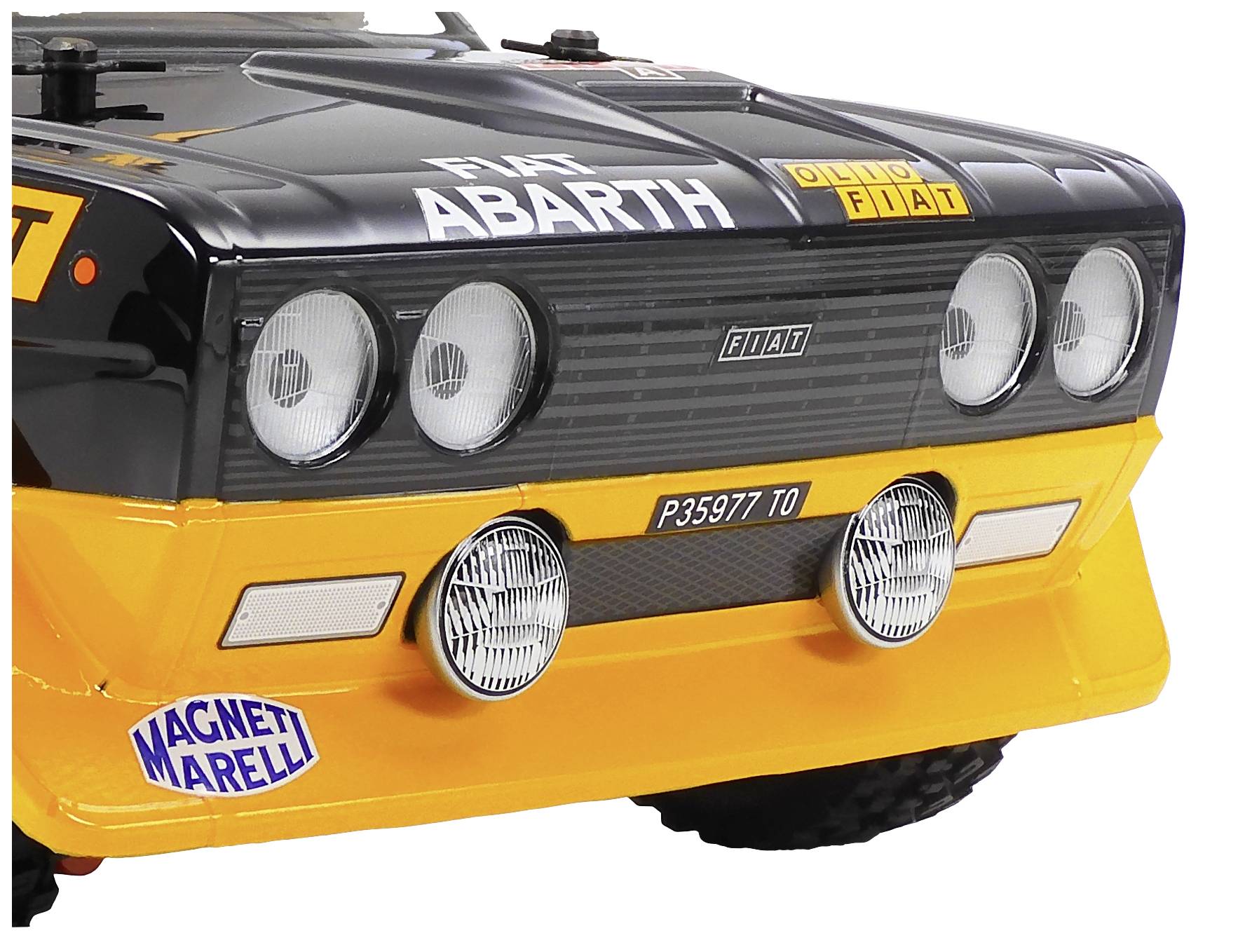 Veicolo da rally con design giallo e nero, fari arrotondati e adesivi, inclusi 'Fiat Abarth' e 'Magneti Marelli'.