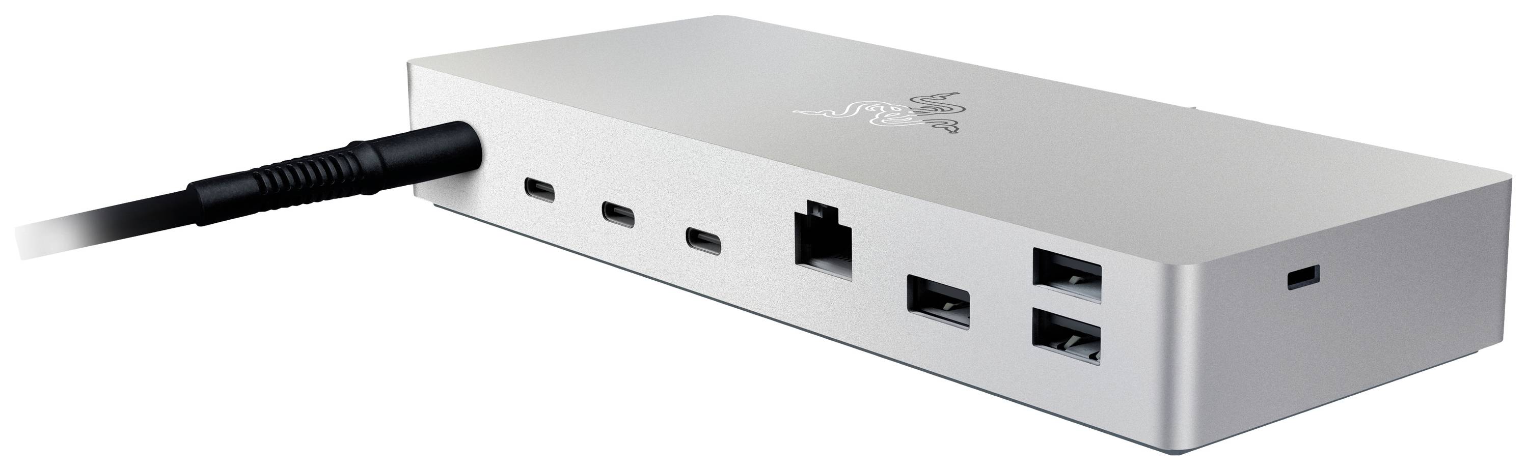 Una stazione di aggancio in argento con multiple possibilità di connessione: porte USB-C, Ethernet e USB-A.
