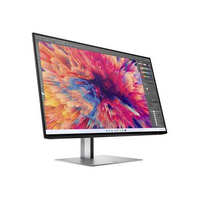 Un monitor del computer mostra un software grafico con un'opera d'arte astratta colorata in rosso, blu e arancione.