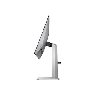 Un monitor per computer fotografato di lato, con un design sottile e un piedistallo argentato.