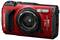 Fotocamera digitale rossa con design robusto, obiettivo grande e flash, adatta per fotografia outdoor, etichettata 'OM System TG-7'.