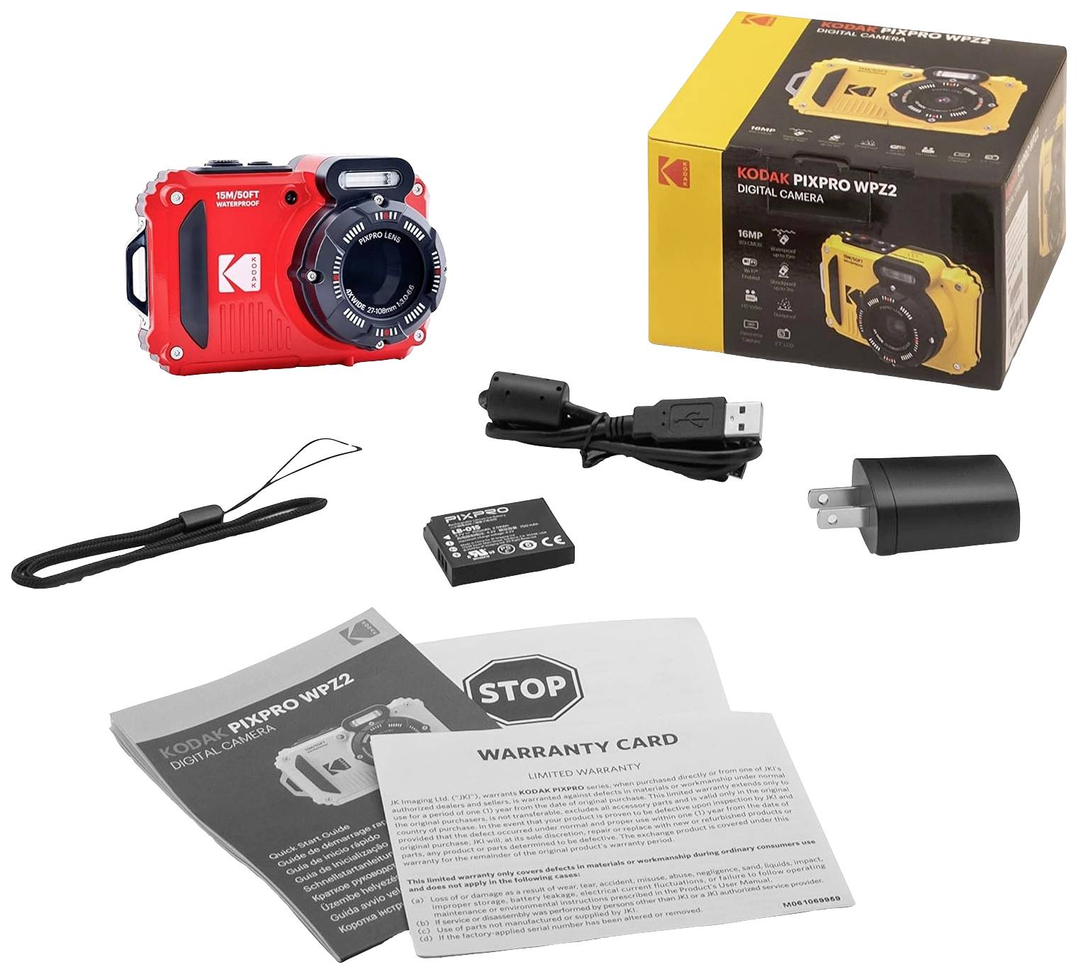 Fotocamera digitale rossa con accessori: cavo USB, caricabatterie, batteria, manuale e garanzia. Confezione che mostra la fotocamera in giallo.