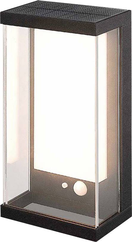 Lampada da esterno con cornice rettangolare nera e pareti trasparenti che emana una luce chiara e diffusa.