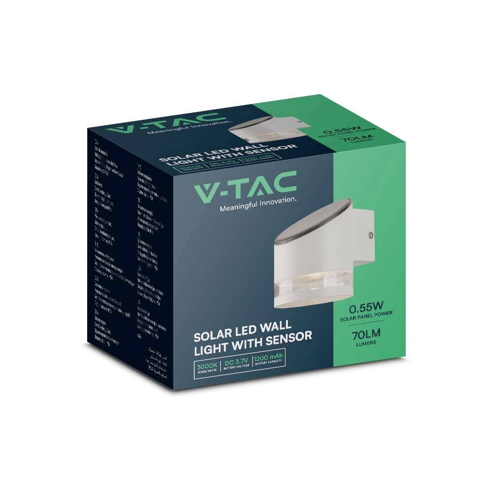 Confezione di un applique solare a LED con sensore. Mostra il nome del prodotto, potenza di 0,55W, 70 lumen, temperatura colore di 3000K e il logo 'V-TAC'.