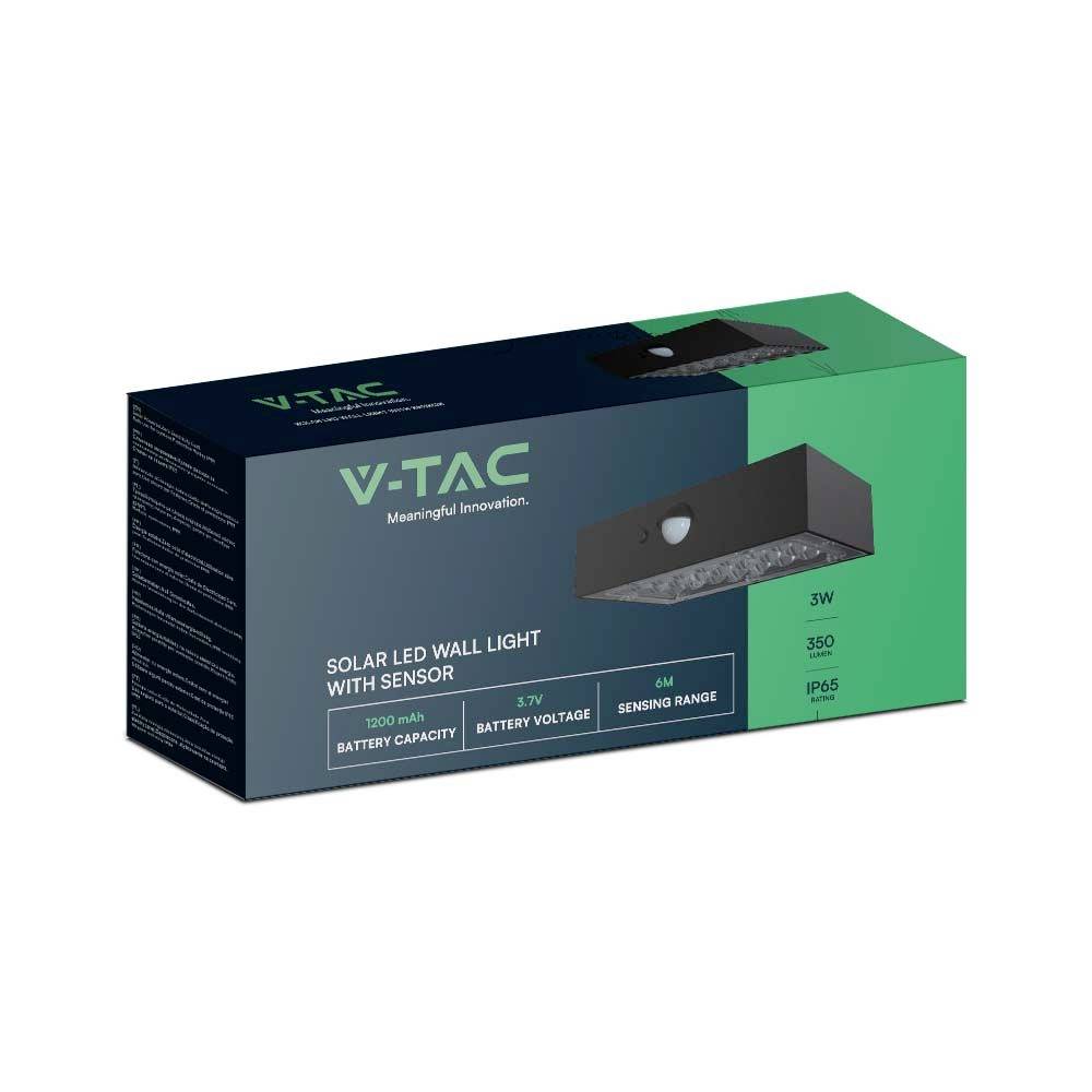 Confezione verde di una lampada da parete LED a energia solare con sensore di movimento di V-TAC. Caratteristiche principali: potenza da 3W, portata del sensore di 6m.
