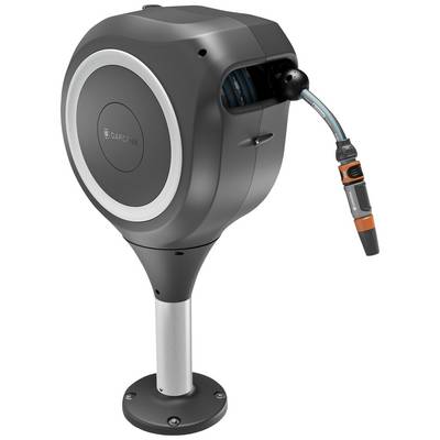 Box avvolgitubo automatica: Scatola rotonda grigia su supporto metallico. Il tubo è parzialmente estratto, ideale per l'uso in giardino.