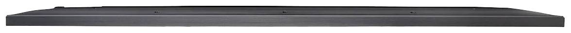 Un dispositivo elettronico nero e piatto con tasti sulla parte superiore, probabilmente una soundbar per l'uscita audio.