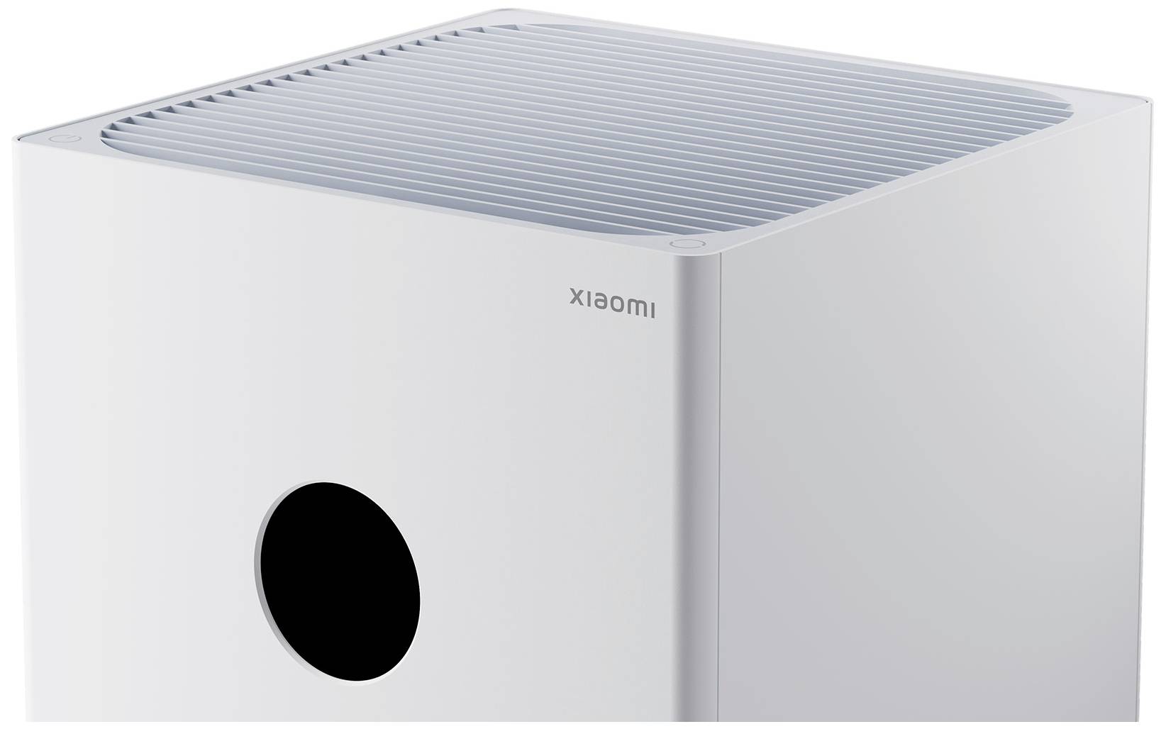 Purificatore d'aria dal design moderno e bianco. Griglia di ventilazione in alto; piccola apertura frontale. Marca 'xiaomi'. Dispositivo per il miglioramento della qualità dell'aria.