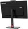 Un monitor Lenovo ThinkVision nero con un accento rosso, ripreso da dietro, è posizionato su un supporto regolabile.