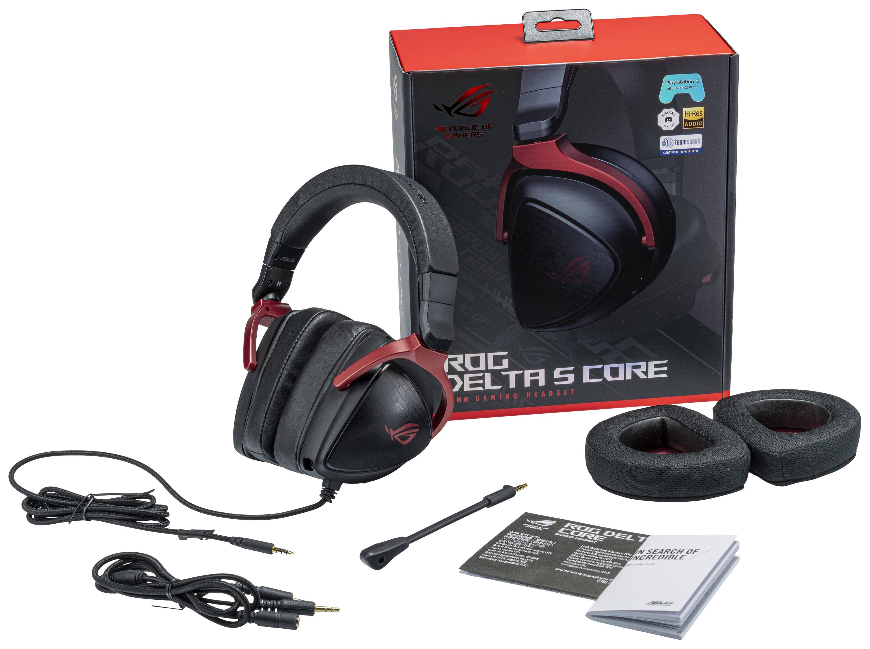 Cuffie da gaming 'ROG Delta S Core' in nero e rosso, con padiglioni auricolari rimovibili, microfono, cavi e manuale di istruzioni davanti alla confezione.