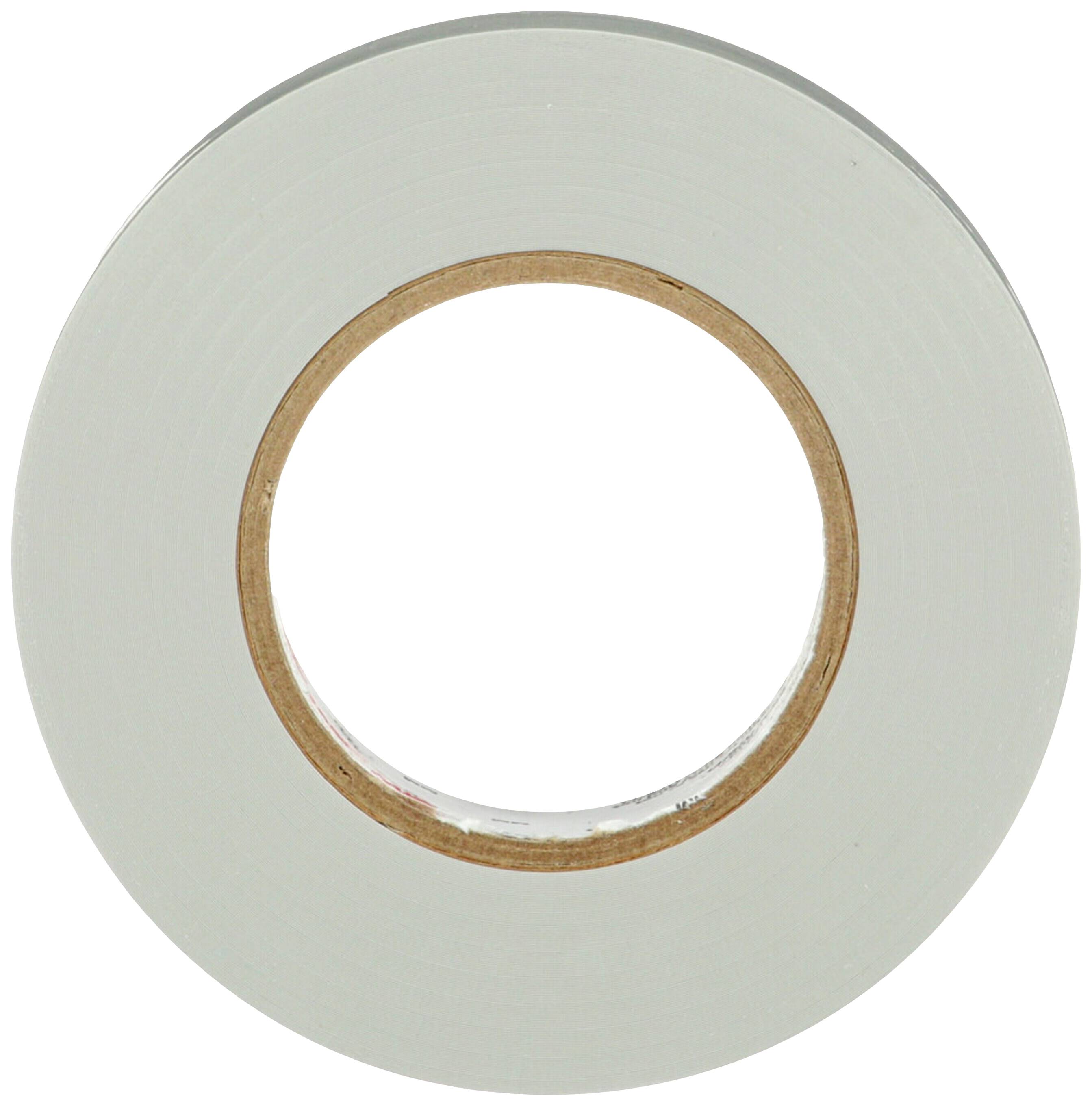 Un rotolo di nastro adesivo grigio con un nucleo interno di cartone marrone, visto dall'alto.