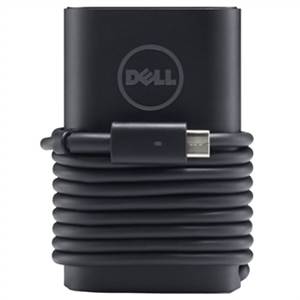 Un caricabatterie nero per laptop Dell con il cavo arrotolato.