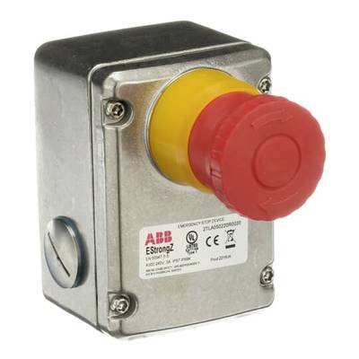 Pulsante di emergenza con bottone rosso e base gialla su involucro metallico, contrassegnato con dettagli del prodotto.