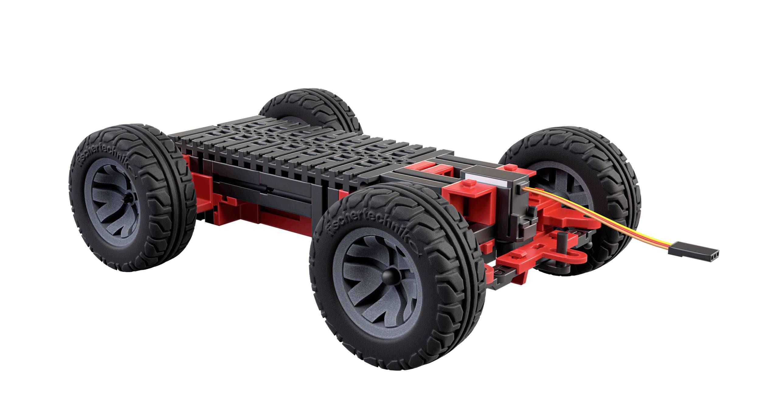 Un piccolo kit robotico a quattro ruote con pneumatici neri, telaio rosso e piattaforma nera, adatto per progetti di elettronica.