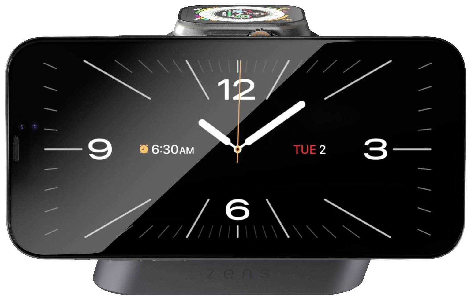 Un smartphone in modalità orizzontale mostra un quadrante analogico che segna le 6:30. Sullo sfondo, uno smartwatch è posizionato su una stazione di ricarica.